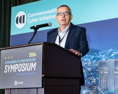 Luiz DaSilva delivers the state of CCI speech at the 2024 CCI Symposium
