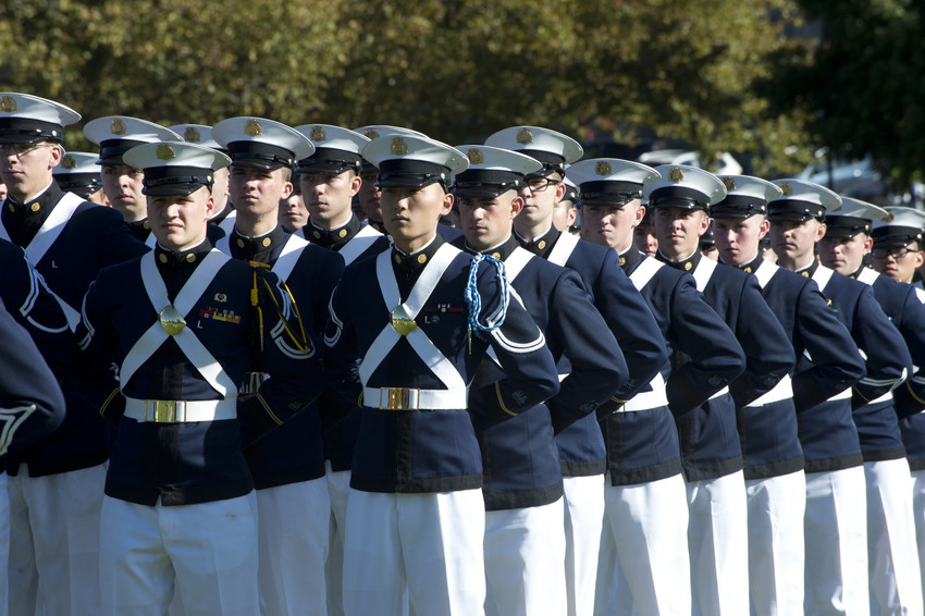 Cadets stand at attention during a Pass in Review.