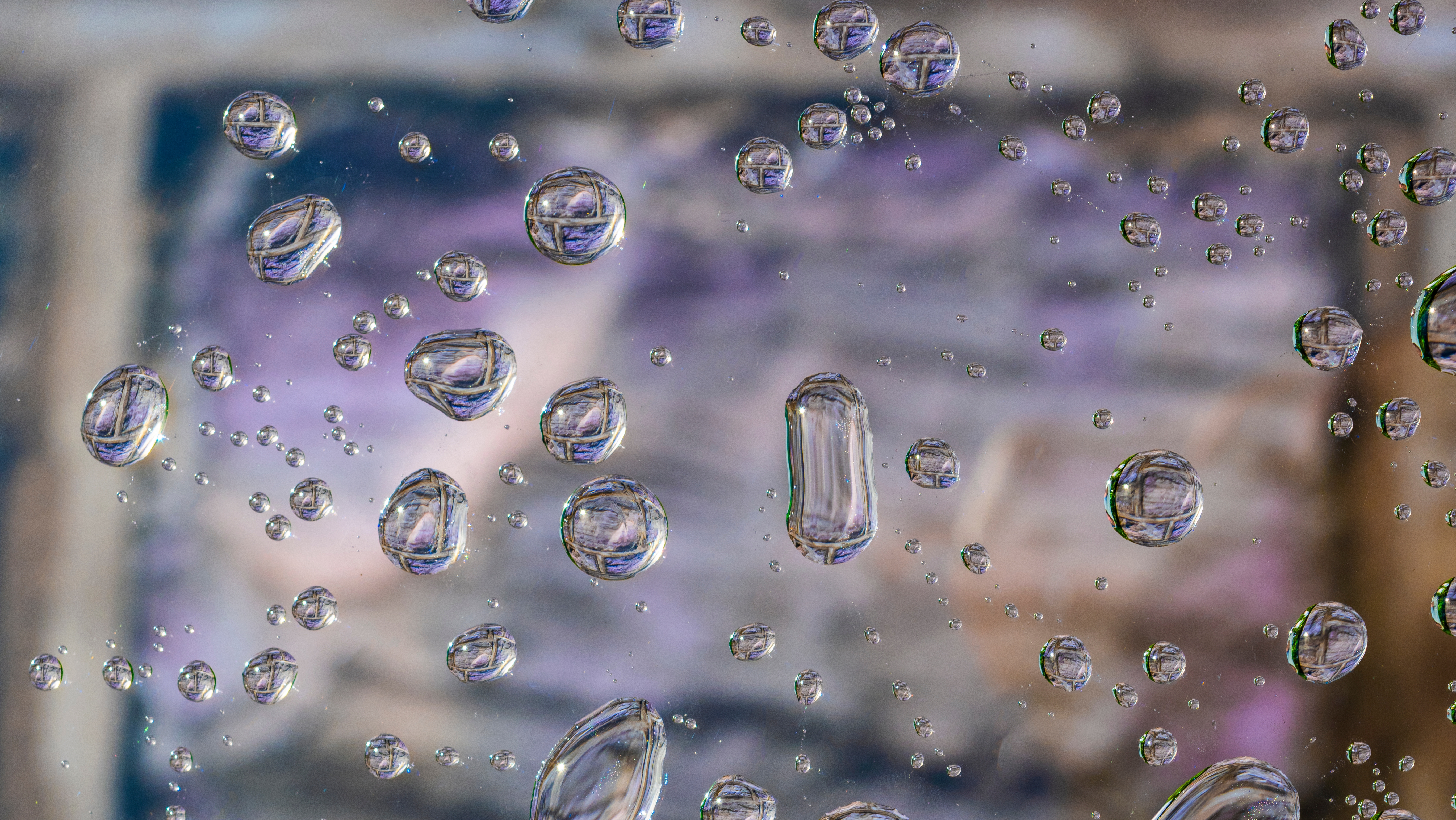 Water Matters Image image of water droplets on glass in front of a hokie stone wall