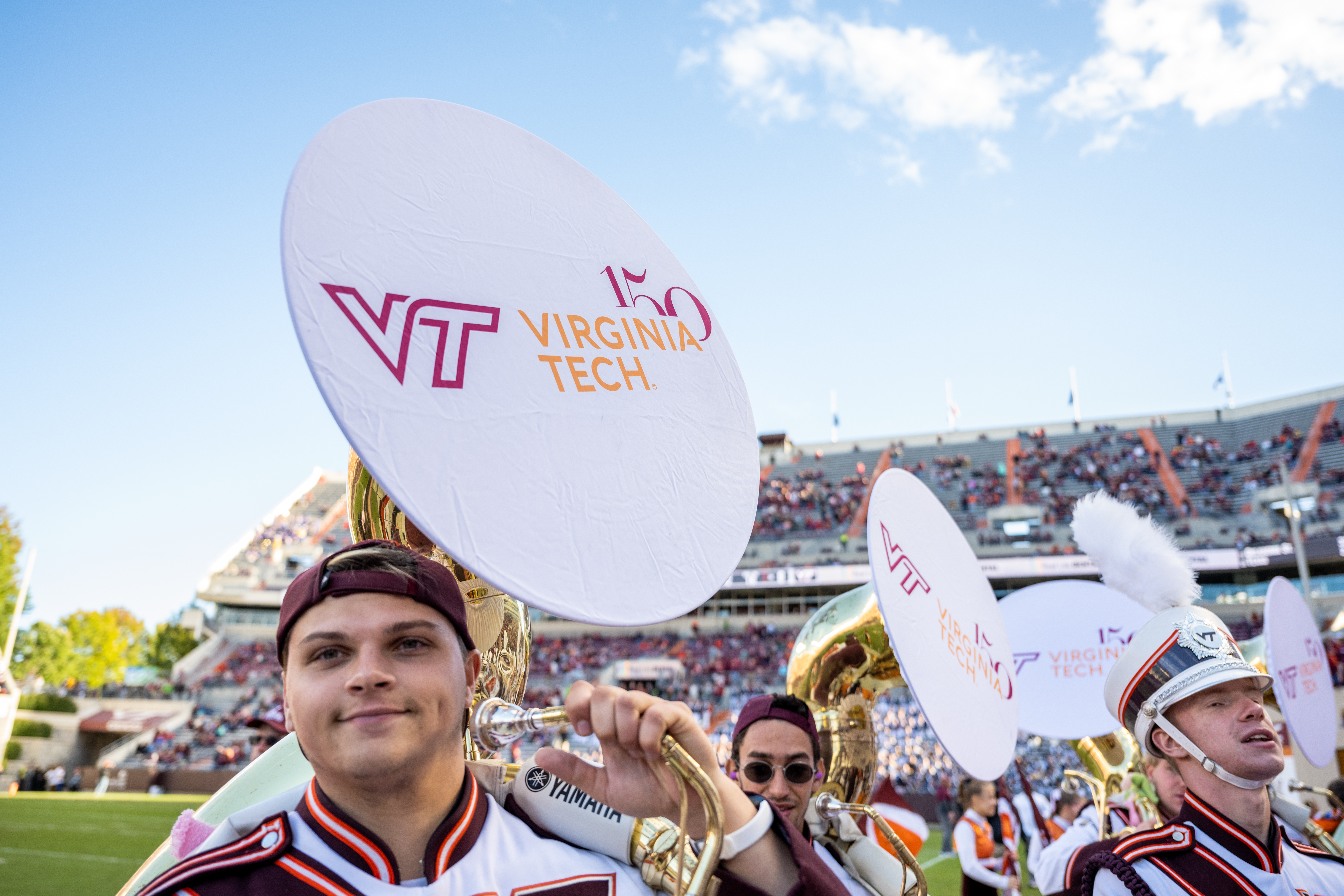 Homecoming game Members of the Marching Virginians on the field Saturday.