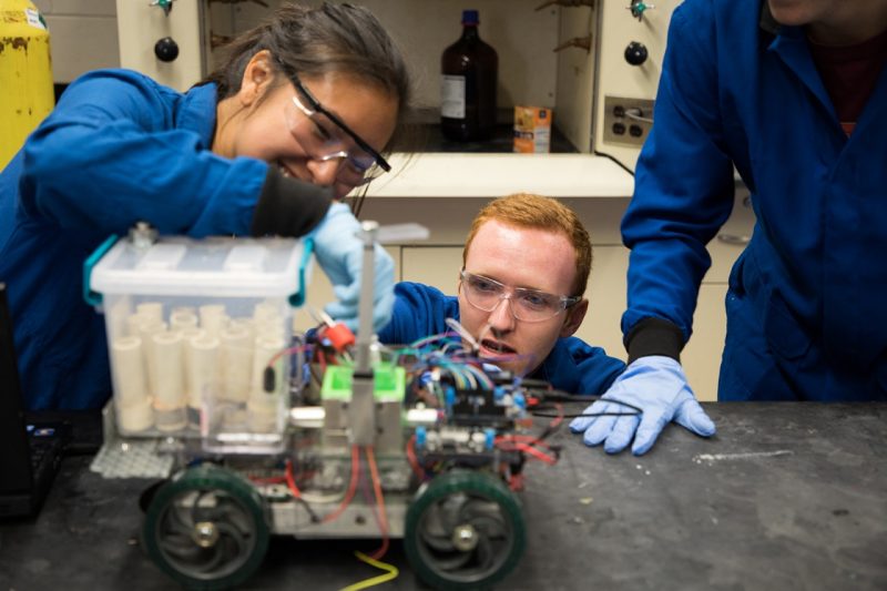 Students working on a robot