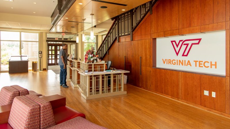 A view of the inside of the Visitor and Undergraduate Admissions Center facing the front desk